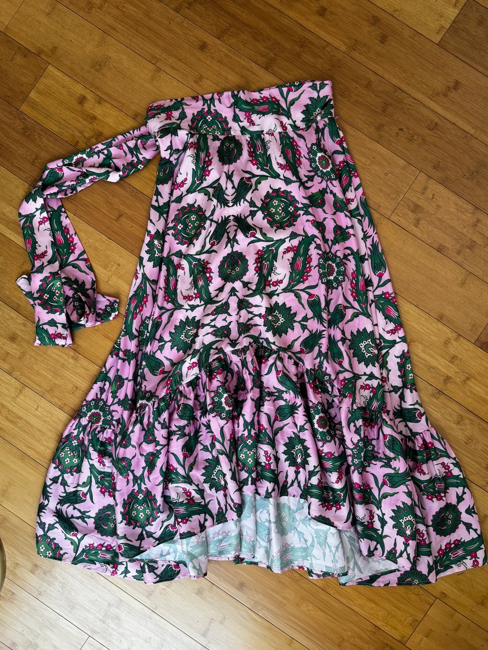 DELFI satin asymmetrical maxi skirt with a ruffle and ties in pink